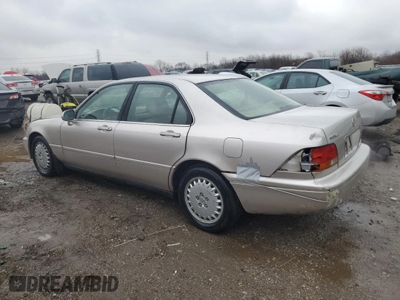 1996 Acura RL Premium with VIN JH4KA9652TC012200, listed as a Copart auction lot 47738615 with 145,330 mi miles and Salvage Title. Bid and sale history available at DreamBid. Image 2.