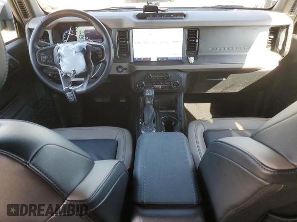 2024 Ford Bronco Wildtrak z VIN 1FMEE2BP1RLA54539, wystawiony jako Copart lot #46310905 z przebiegiem 12 545 mil mil oraz Szkody całkowita. Historia ofert i sprzedaży dostępna na DreamBid. Obrazek 8.