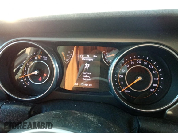 2018 Jeep Wrangler Sport with VIN 1C4GJXAG7JW188322, listed as a Copart auction lot 87352914 with 101,964 mi miles and Salvage Title. Bid and sale history available at carsss.com. Image 9.