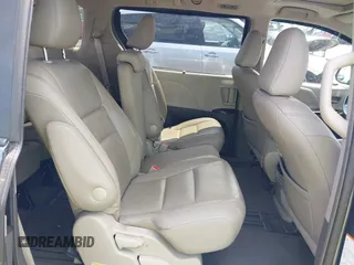2016 Toyota Sienna XLE z VIN 5TDYK3DC2GS739042, wystawiony jako IAAI lot #42163983 z przebiegiem 98 842 mil mil oraz . Historia ofert i sprzedaży dostępna na DreamBid. Obrazek 8.
