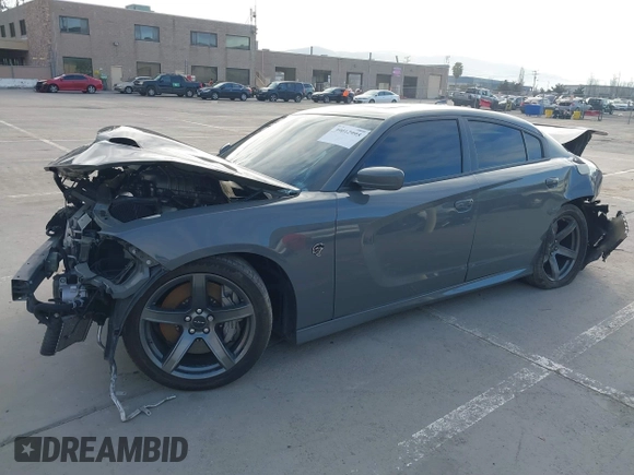 2019 Dodge Charger SRT Hellcat with VIN 2C3CDXL95KH725925, listed as a IAAI auction lot 39012995 with Not Provided miles and . Bid and sale history available at DreamBid. Image 2.