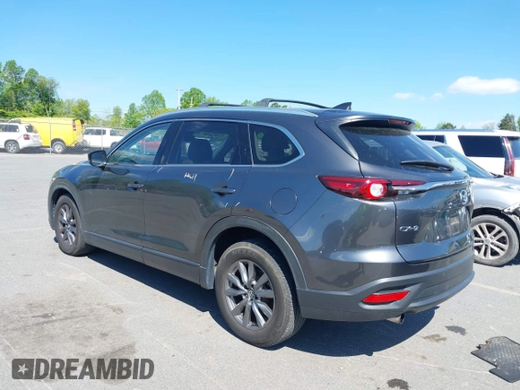 2021 Mazda CX-9 Touring with VIN JM3TCACY7M0503484, listed as a IAAI auction lot 42013262 with 63,777 mi miles and . Bid and sale history available at DreamBid. Image 3.