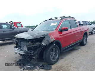2023 Honda Ridgeline RTL with VIN 5FPYK3F53PB059323, listed as a IAAI auction lot 42485621 with Not provided miles and . Bid and sale history available at DreamBid. Image 2.