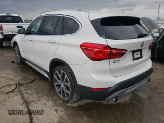 2016 BMW X1 xDrive28i with VIN WBXHT3C34G5E54286, listed as a Copart auction lot 41501873 with 30,176 mi miles. Bid and sale history available at carsss.com. Image 2.