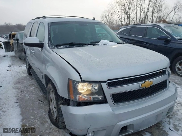 2014 Chevrolet Suburban LT with VIN 1GNSKJE7XER226670, listed as a IAAI auction lot 41301490 with 157,842 mi miles. Bid and sale history available at carsss.com. Image 1.