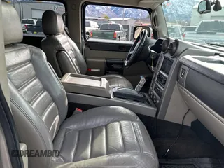 2003 Hummer H2 with VIN 5GRGN23UX3H124517, listed as a Copart auction lot 41650395 with 999,999 mi miles and Clean Title. Bid and sale history available at carsss.com. Image 5.