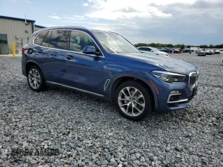 2019 BMW X5 xDrive40i with VIN 5UXCR6C53KLL63986, listed as a Copart auction lot 60786055 with 72,241 mi miles and Salvage title. Bid and sale history available at DreamBid. Image 4.