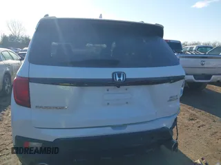 2023 Honda Passport Elite with VIN 5FNYF8H05PB005081, listed as a IAAI auction lot 41698186 with 31,853 mi miles and . Bid and sale history available at DreamBid. Image 16.