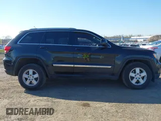 2012 Jeep Grand Cherokee Laredo with VIN 1C4RJFAG5CC118826, listed as a IAAI auction lot 42039801 with 158,153 mi miles. Bid and sale history available at carsss.com. Image 13.