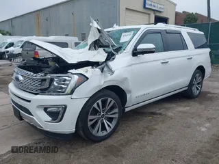 2020 Ford Expedition Max Platinum z VIN 1FMJK1MT1LEB00801, wystawiony jako IAAI lot #42441525 z przebiegiem 40 193 mil mil oraz . Historia ofert i sprzedaży dostępna na DreamBid. Obrazek 2.