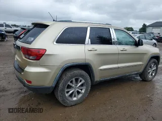 2011 Jeep Grand Cherokee Laredo z VIN 1J4RR4GG0BC562824, wystawiony jako Copart lot #61625445 z przebiegiem 166 490 mil mil oraz Czysty tytuł • Clean title. Historia ofert i sprzedaży dostępna na DreamBid. Obrazek 3.