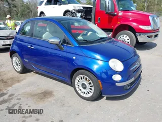 2012 FIAT 500 Lounge z VIN 3C3CFFCR1CT106350, wystawiony jako IAAI lot #42003075 z przebiegiem 115 357 mil mil oraz . Historia ofert i sprzedaży dostępna na DreamBid. Obrazek 1.