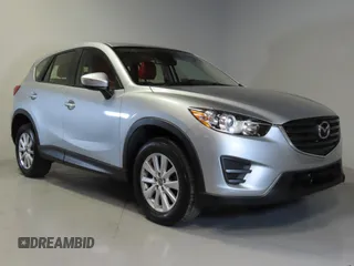 2016 Mazda CX-5 Sport with VIN JM3KE2BEXG0904597, listed as a Copart auction lot 42407975 with 63,343 mi miles and Salvage Title. Bid and sale history available at carsss.com. Image 1.