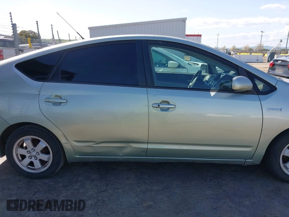 2007 Toyota Prius z VIN JTDKB20U877556527, wystawiony jako IAAI lot #41965245 z przebiegiem 259 572 mil mil oraz . Historia ofert i sprzedaży dostępna na DreamBid. Obrazek 13.