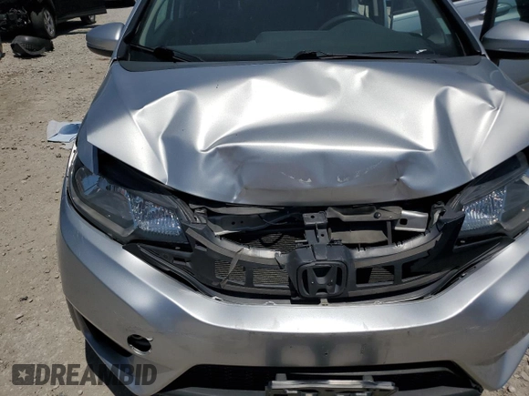 2015 Honda Fit LX z VIN 3HGGK5H52FM738587, wystawiony jako Copart lot #61231705 z przebiegiem 134 623 mil mil oraz Szkoda całkowita • Salvage title. Historia ofert i sprzedaży dostępna na DreamBid. Obrazek 11.