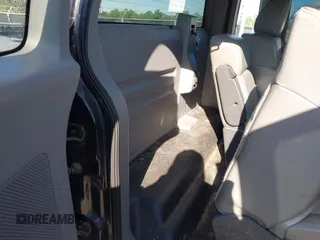 2007 Ford F-150 XL with VIN 1FTRF12297NA81619, listed as a IAAI auction lot 41855562 with 310,954 mi miles. Bid and sale history available at carsss.com. Image 8.