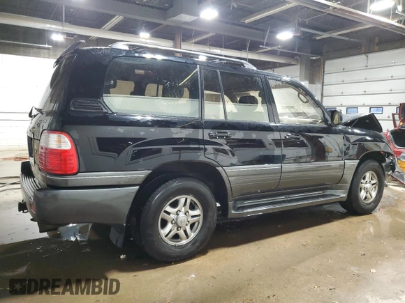 2002 Lexus LX 470 z VIN JTJHT00W023515545, wystawiony jako Copart lot #79218054 z przebiegiem 310 334 mil mil oraz Szkoda całkowita • Salvage title. Historia ofert i sprzedaży dostępna na DreamBid. Obrazek 3.