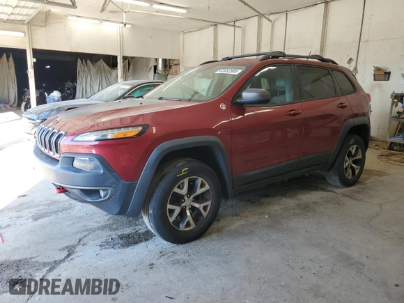 2015 Jeep Cherokee Trailhawk with VIN 1C4PJMBS1FW745928, listed as a Copart auction lot 62032585 with 132,559 mi miles and Salvage title. Bid and sale history available at DreamBid. Image 1.