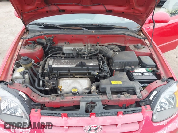 2005 Hyundai Accent GLS with VIN KMHCG45CX5U614083, listed as a IAAI auction lot 41006582 with 72,516 mi miles. Bid and sale history available at carsss.com. Image 10.