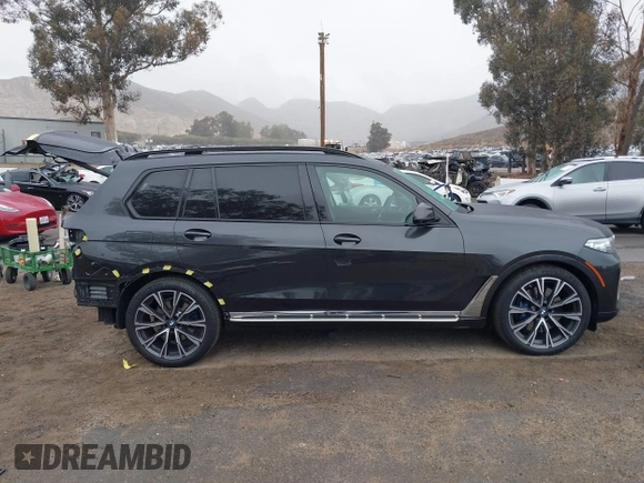 2021 BMW X7 xDrive40i z VIN 5UXCW2C02M9D83199, wystawiony jako IAAI lot #41556053 z przebiegiem 38 926 mil mil oraz . Historia ofert i sprzedaży dostępna na DreamBid. Obrazek 14.