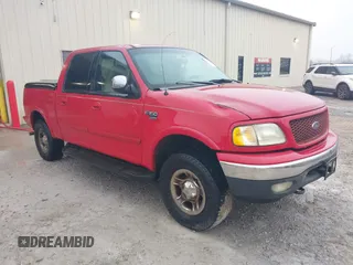 2001 Ford F-150 SuperCrew XLT with VIN 1FTRW08W21KD54297, listed as a IAAI auction lot 41504662 with 1 mi miles. Bid and sale history available at carsss.com. Image 1.