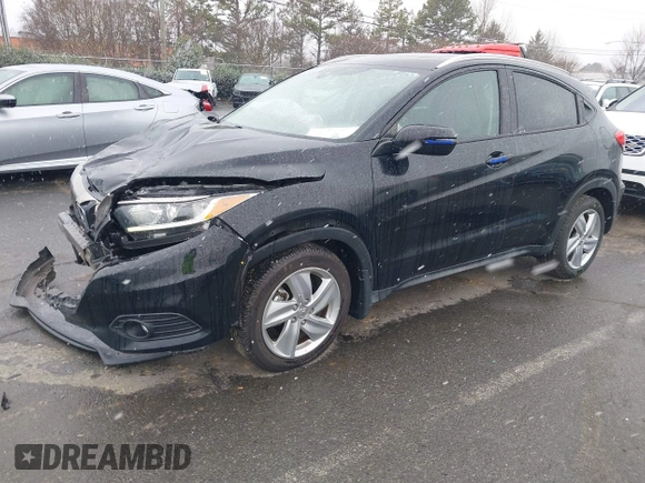 2019 Honda HR-V EX with VIN 3CZRU5H52KM704011, listed as a IAAI auction lot 41616517 with 57,921 mi miles. Bid and sale history available at carsss.com. Image 2.