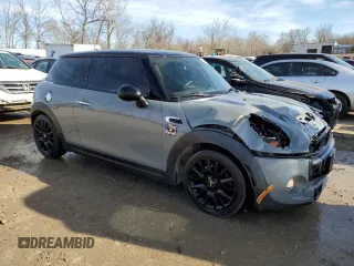 2014 MINI Hardtop S with VIN WMWXM7C57ET987816, listed as a Copart auction lot 41115434 with 122,724 mi miles and Salvage title. Bid and sale history available at DreamBid. Image 4.