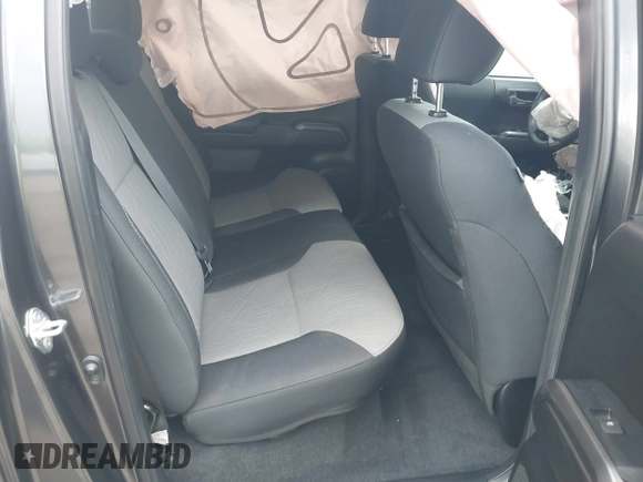 2022 Toyota Tacoma SR5 with VIN 3TMAZ5CN6NM186713, listed as a IAAI auction lot 42607719 with 60,704 mi miles and . Bid and sale history available at DreamBid. Image 8.