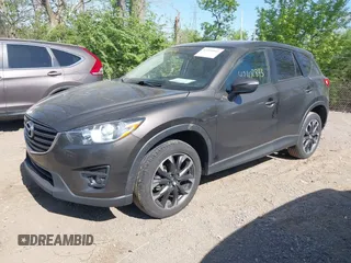 2016 Mazda CX-5 Grand Touring z VIN JM3KE4DY8G0846265, wystawiony jako IAAI lot #42102843 z przebiegiem 159 827 mil mil oraz . Historia ofert i sprzedaży dostępna na DreamBid. Obrazek 17.