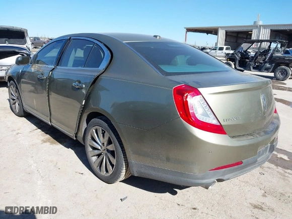 2013 Lincoln MKS with VIN 1LNHL9DK6DG606440, listed as a IAAI auction lot 41378327 with 190192 miles. Bid and sale history available at carsss.com. Image 3.
