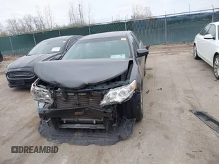 2014 Toyota Camry L with VIN 4T4BF1FK6ER364253, listed as a IAAI auction lot 42011773 with 87,051 mi miles. Bid and sale history available at carsss.com. Image 13.