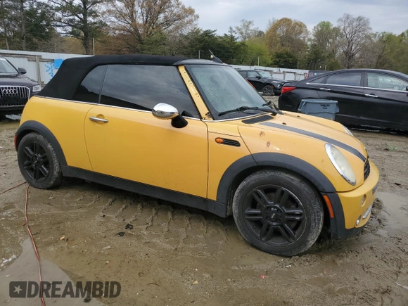 2007 MINI Convertible with VIN WMWRF33507TG17373, listed as a Copart auction lot 52818825 with 207,096 mi miles and Salvage Title. Bid and sale history available at DreamBid. Image 4.