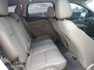 2015 Ford Escape Titanium z VIN 1FMCU9J90FUC41606, wystawiony jako Copart lot #57458455 z przebiegiem 71 671 mil mil oraz Szkoda całkowita • Salvage title. Historia ofert i sprzedaży dostępna na DreamBid. Obrazek 11.