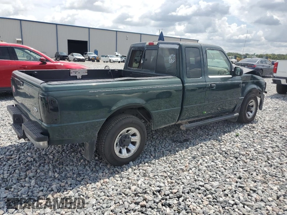 2002 Ford Ranger XLT Appearance with VIN 1FTYR44E42TA32828, listed as a Copart auction lot 60205715 with 290,846 mi miles and Salvage title. Bid and sale history available at DreamBid. Image 3.