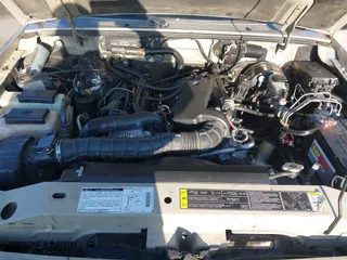 2002 Ford Ranger XL Fleet with VIN 1FTYR44U82PA96662, listed as a IAAI auction lot 41450480 with 275,469 mi miles. Bid and sale history available at carsss.com. Image 10.
