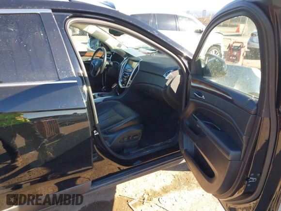 2016 Cadillac SRX Luxury Collection with VIN 3GYFNEE39GS583306, listed as a IAAI auction lot 41312161 with 98,831 mi miles. Bid and sale history available at carsss.com. Image 5.