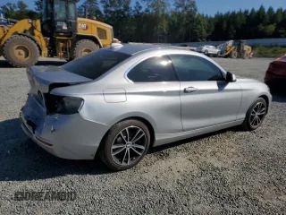 2020 BMW 2 Series 230i with VIN WBA2J1C06L7E79656, listed as a Copart auction lot 74909234 with 50,931 mi miles and Salvage Title. Bid and sale history available at carsss.com. Image 3.