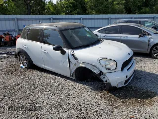 2014 MINI Countryman S with VIN WMWZC3C59EWT00838, listed as a Copart auction lot 53608055 with 114,520 mi miles and Non Repairable. Bid and sale history available at DreamBid. Image 4.