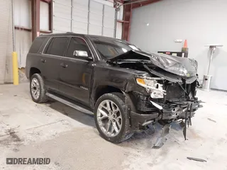 2015 Chevrolet Tahoe LTZ with VIN 1GNSCCKC2FR114442, listed as a IAAI auction lot 41629816 with 152,768 mi miles. Bid and sale history available at carsss.com. Image 1.