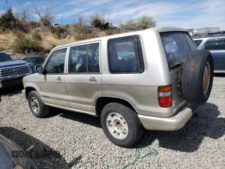 1994 Isuzu Trooper z VIN JACDH58V7R7929502, wystawiony jako Copart lot #70280554 z przebiegiem 243 827 mil mil oraz Tytuł czysty. Historia ofert i sprzedaży dostępna na DreamBid. Obrazek 2.