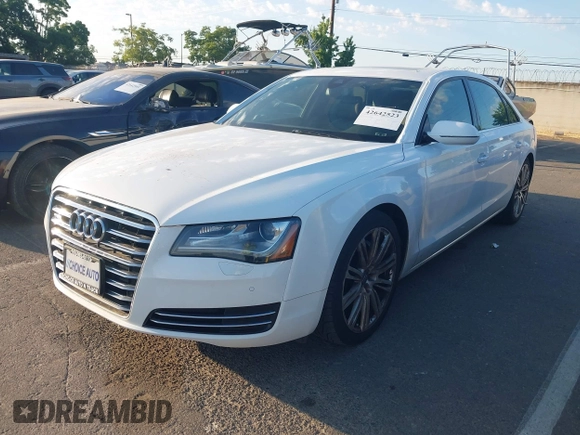 2013 Audi A8 3.0L z VIN WAURGAFD5DN009804, wystawiony jako IAAI lot #42642523 z przebiegiem 141 252 mil mil oraz . Historia ofert i sprzedaży dostępna na DreamBid. Obrazek 2.