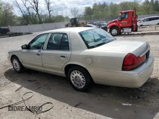2004 Mercury Grand Marquis GS z VIN 2MEFM74W94X601693, wystawiony jako Copart lot #56303935 z przebiegiem 98 674 mil mil oraz Czysty tytuł • Clean title. Historia ofert i sprzedaży dostępna na DreamBid. Obrazek 2.