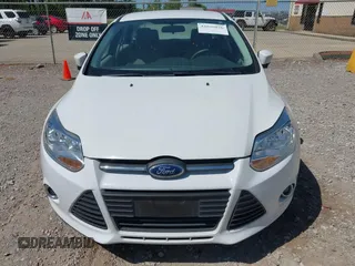 2012 Ford Focus SE with VIN 1FAHP3F22CL381061, listed as a IAAI auction lot 42036836 with 130,437 mi miles. Bid and sale history available at carsss.com. Image 6.