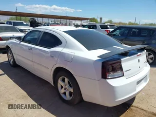 2010 Dodge Charger SXT with VIN 2B3CA3CV5AH297994, listed as a IAAI auction lot 42153457 with 157,017 mi miles. Bid and sale history available at carsss.com. Image 3.
