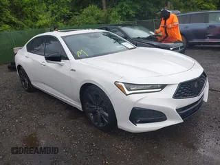 2021 Acura TLX w/A-Spec Package with VIN 19UUB5F59MA010796, listed as a IAAI auction lot 42303196 with 56,671 mi miles and . Bid and sale history available at DreamBid. Image 1.