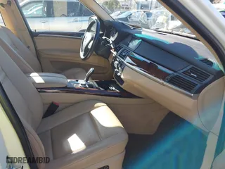 2007 BMW X5 3.0si with VIN 5UXFE43567LY82907, listed as a IAAI auction lot 41499356 with 117,173 mi miles. Bid and sale history available at carsss.com. Image 5.