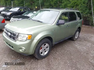 2008 Ford Escape Hybrid with VIN 1FMCU59H88KC30923, listed as a IAAI auction lot 42440706 with 98,635 mi miles and . Bid and sale history available at DreamBid. Image 2.