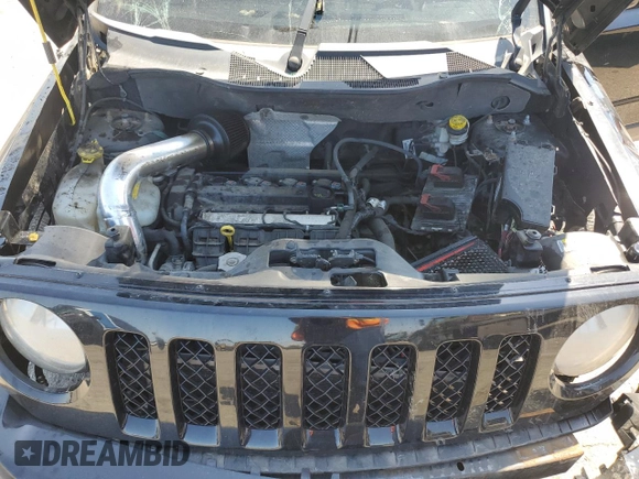 2014 Jeep Patriot Altitude with VIN 1C4NJPBA1ED715273, listed as a Copart auction lot 54335405 with 118,975 mi miles and Salvage Title. Bid and sale history available at DreamBid. Image 12.