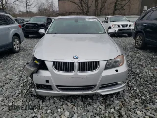2007 BMW 3 Series 335xi with VIN WBAVD53547AV14739, listed as a Copart auction lot 50058055 with 141,075 mi miles and Clean Title. Bid and sale history available at carsss.com. Image 5.