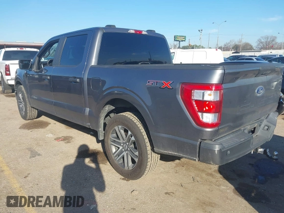 2021 Ford F-150 XL with VIN 1FTEW1C56MFA89903, listed as a IAAI auction lot 41657308 with 105,626 mi miles. Bid and sale history available at carsss.com. Image 3.